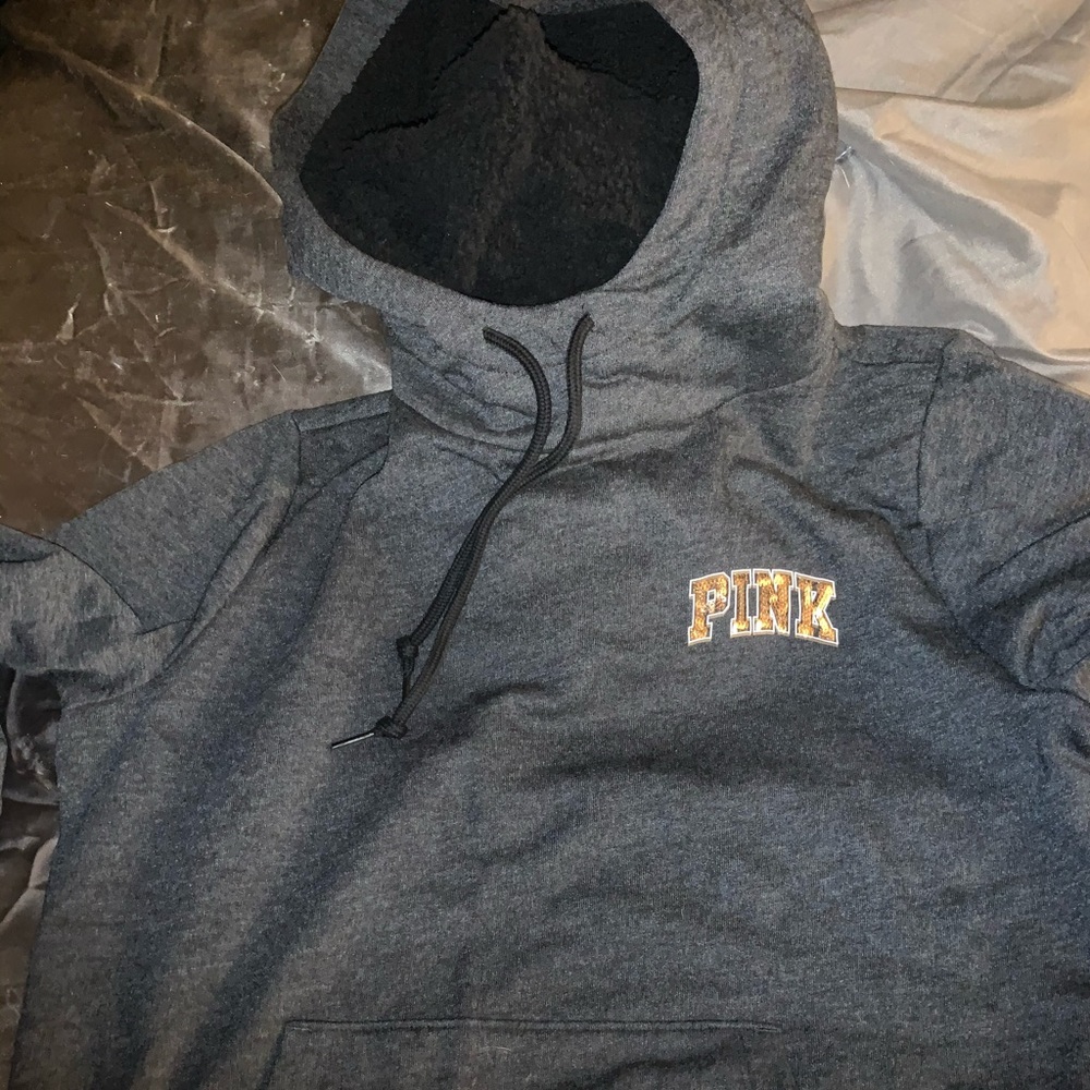 A hooded PINK sweater